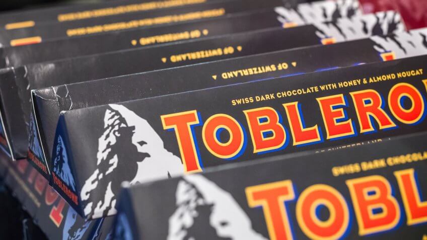 London, UK - August 12, 2018 - Toblerone Swiss dark chocolate on display at a duty free shop in London Heathrow Airport.
