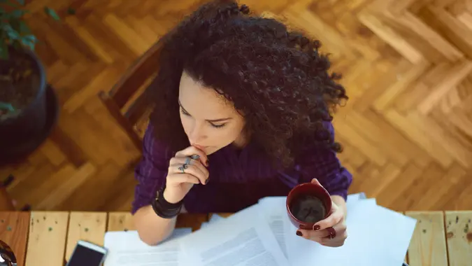 Woman working at home.