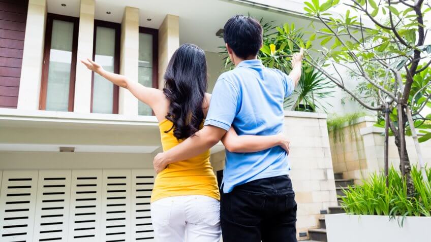 couple excited about house.