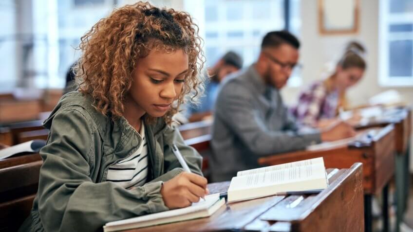 Cropped shot of university students sitting in class.