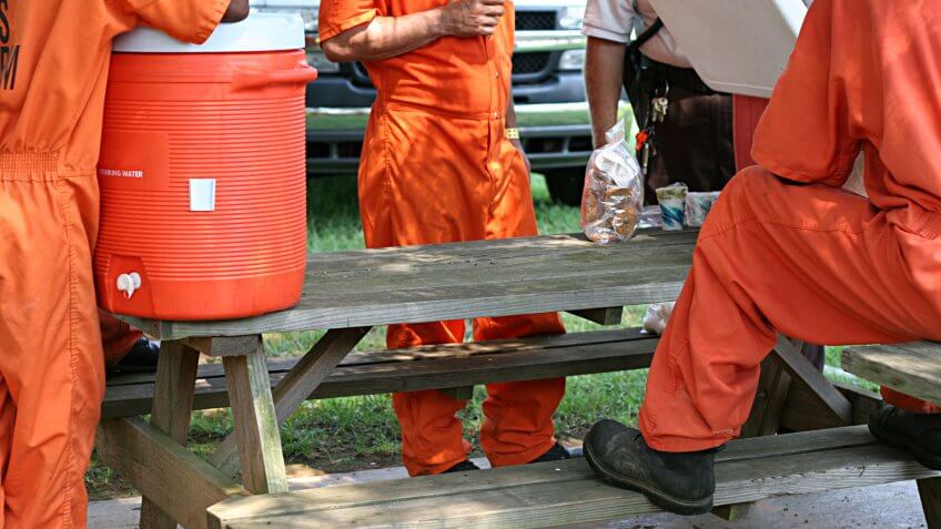 Inmates taking a break from community service work.