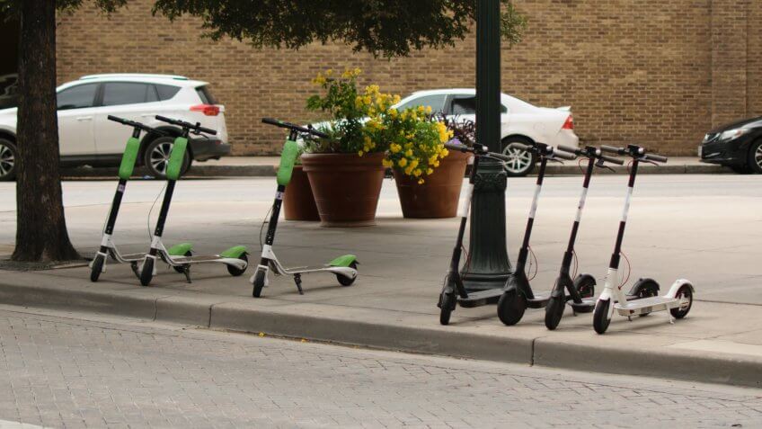 dockless electric scooters on a sidewalk