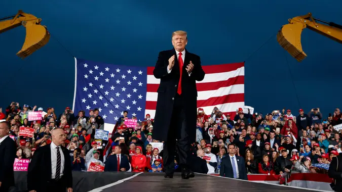 Mandatory Credit: Photo by Evan Vucci/AP/REX/Shutterstock (9930246a)President Donald Trump waves as he arrives for a campaign rally, in Lebanon, OhioElection 2018 Trump, Lebanon, USA - 12 Oct 2018.