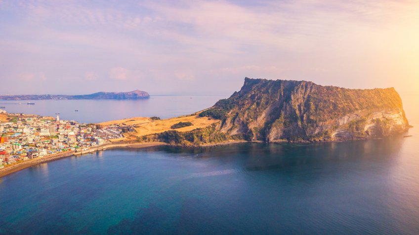 Sunrise of Jeju Do City at Seongsan Ilchulbong , Jeju Island, South Korea.