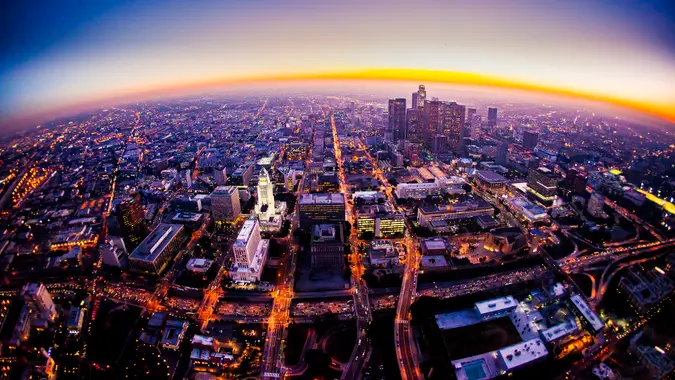Aerial view of Los Angeles Skyline at sunset from a helicopter.