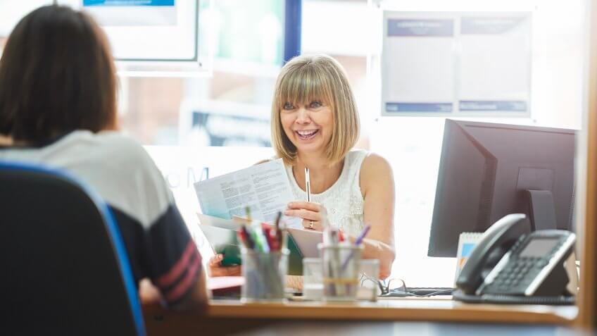 Businesswoman in meeting with customer in the office.