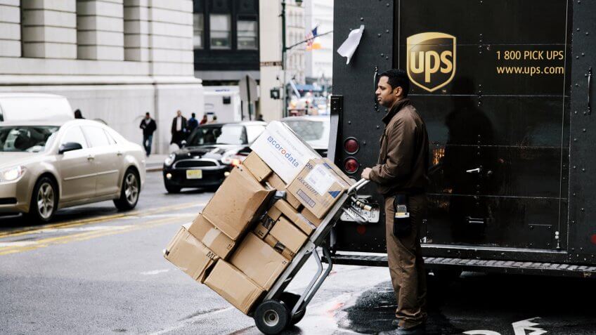 UPS worker delivering packages
