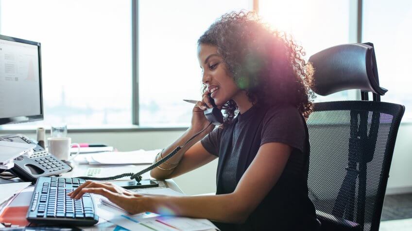 businesswoman investor on the phone