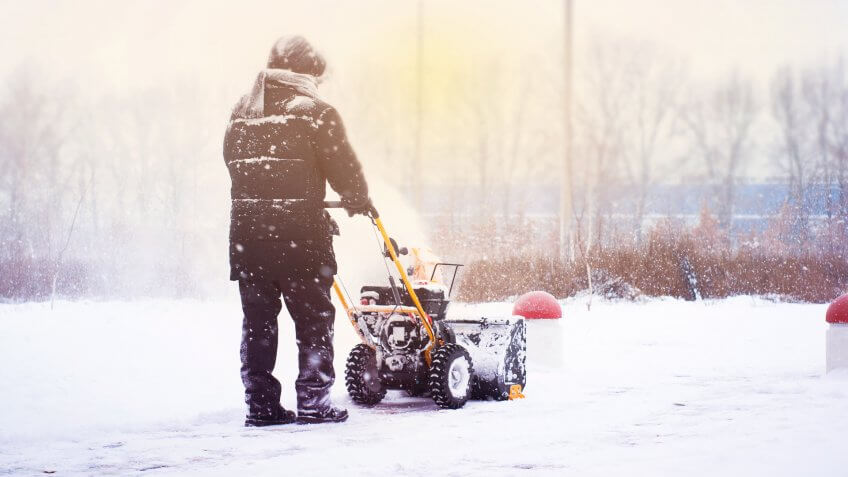 person removing snow