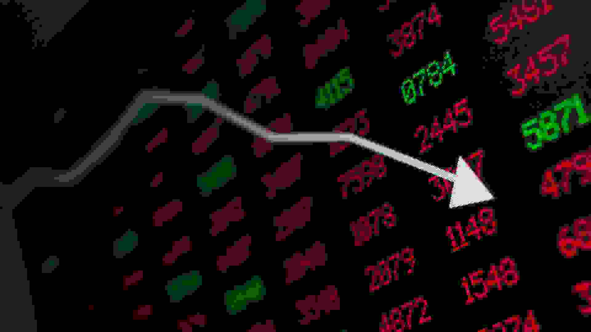 Stock Market - Arrow Graph Going Down on Display With Red and Green Figures.