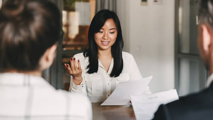 young woman talking about her goals in interview