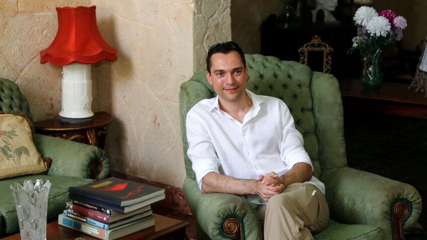 Photo by Desmond Boylan/AP/REX/Shutterstock Co-founder of AirBnb Nathan Blecharczyk visits with guesthouse owner Armando Usain at his home in Havana, Cuba, . AirBnb has become an important player in international travel by connecting private home owners around the world with travelers who want to rent spaces ranging from a room in an occupied home to an entire house Cuba AirBnb, Havana, Cuba