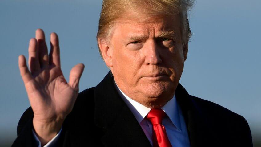 Mandatory Credit: Photo by Susan Walsh/AP/REX/Shutterstock (9943723b)President Donald Trump walks to board Air Force One at Andrews Air Force Base in Md.