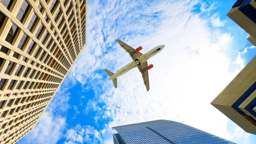 Airplane flying over Atlanta, Georgia, USA.