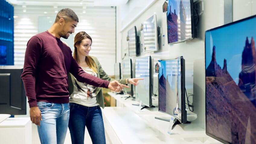 couple shopping for a new television