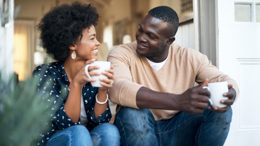 happy young couple spending time together outside.