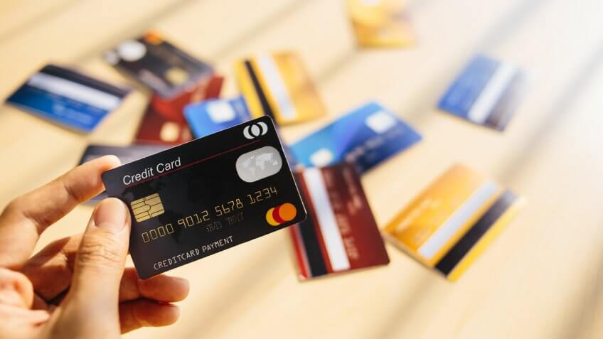 Credit card concept with window light on desk.