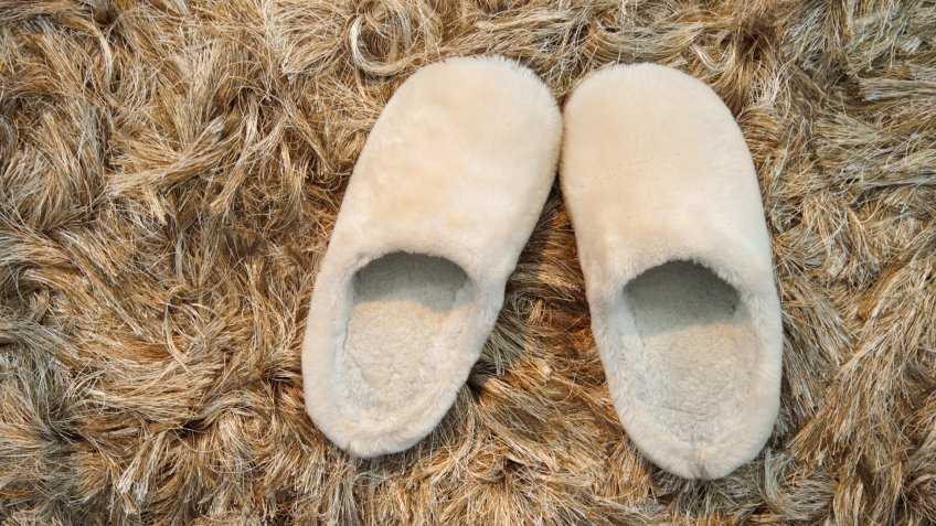 pair of warming white comfort fur slipper