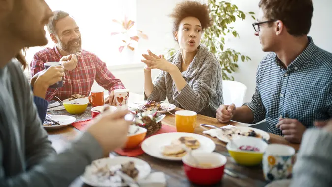 Closeup of multi generation family having lunch at home.