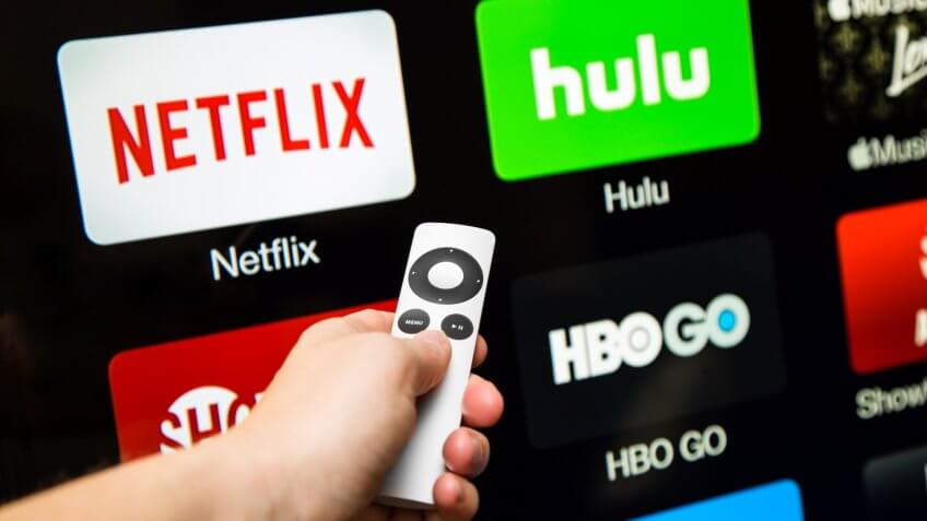 Canton, GA, USA - October 4, 2015 Netflix, hulu, and hbo subscription streaming video service accessed through a Apple tv and displayed on a hd tv.