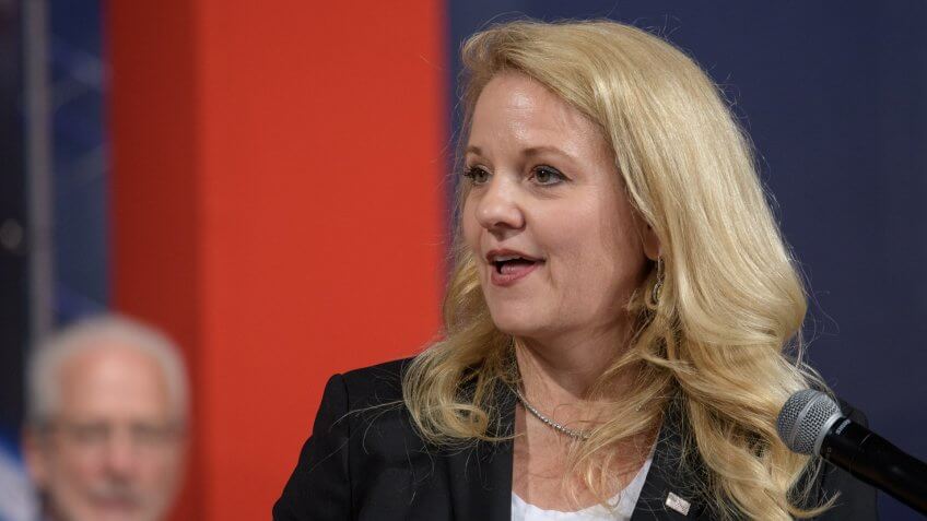SpaceX President and Chief Operation Officer Gwynne Shotwell gives remarks during a NASA event announcing the astronauts assigned to crew the first flight tests and missions of the Boeing CST-100 Starliner and SpaceX Crew Dragon, Friday, Aug.
