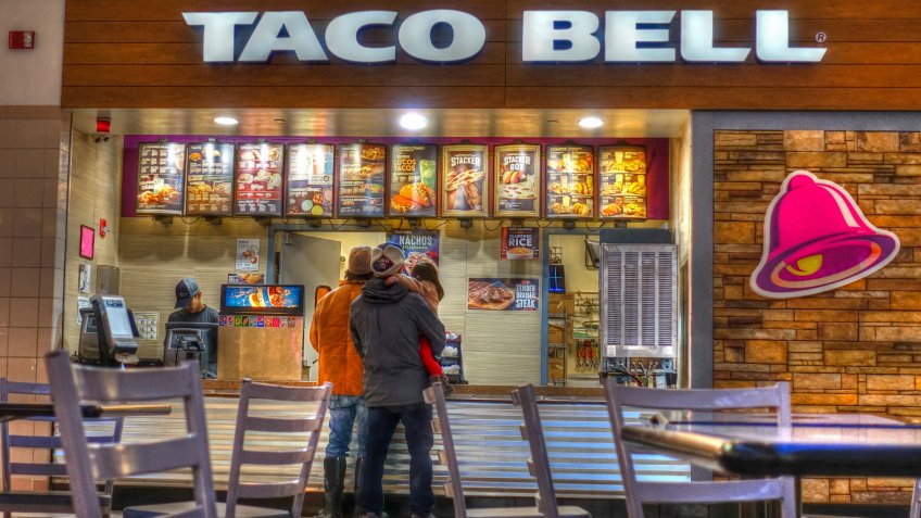 HDR image, Taco Bell restaurant menu ordering counter, shopping mall food court - Saugus, Massachusetts USA - January 5, 2018.