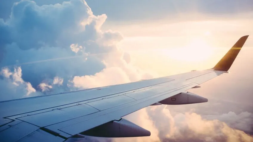 airplane sun clouds ross-parmly-25230-unsplash