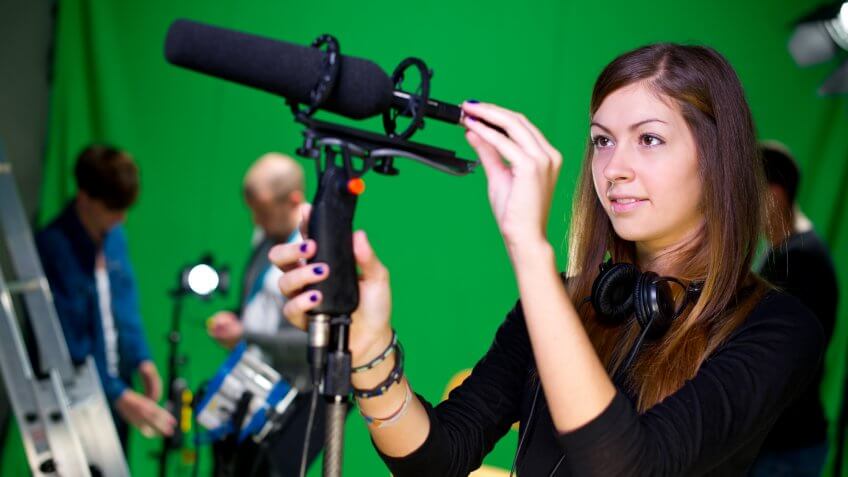media student in college tv studio.