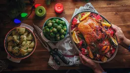 I Asked ChatGPT How To Host Christmas Dinner for Under $100: Here’s What It Said