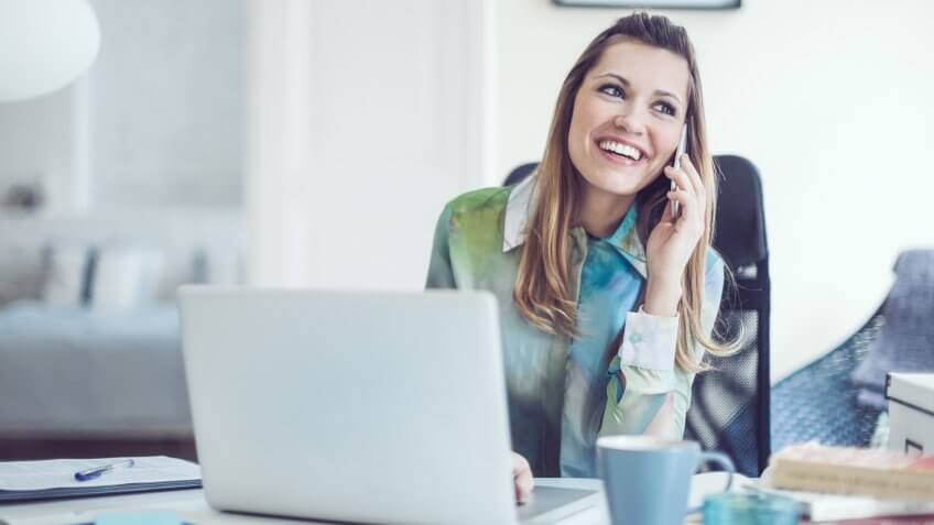Portrait of a content, smiling young woman.