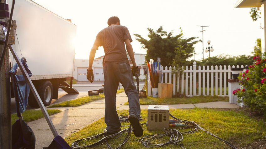 professional gaffer setting up electrical supply