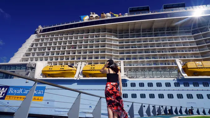 Fort-de-France, Martinique - April 23, 2017: On Pier, a woman is looking at Anthem of the Seas cruise ship.