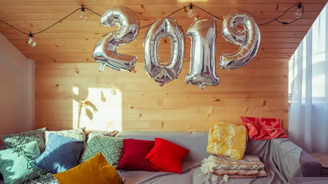 Home interior with new year's decorative balloons.
