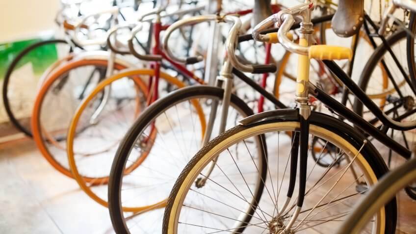 Bicycles parked in a bike shop.