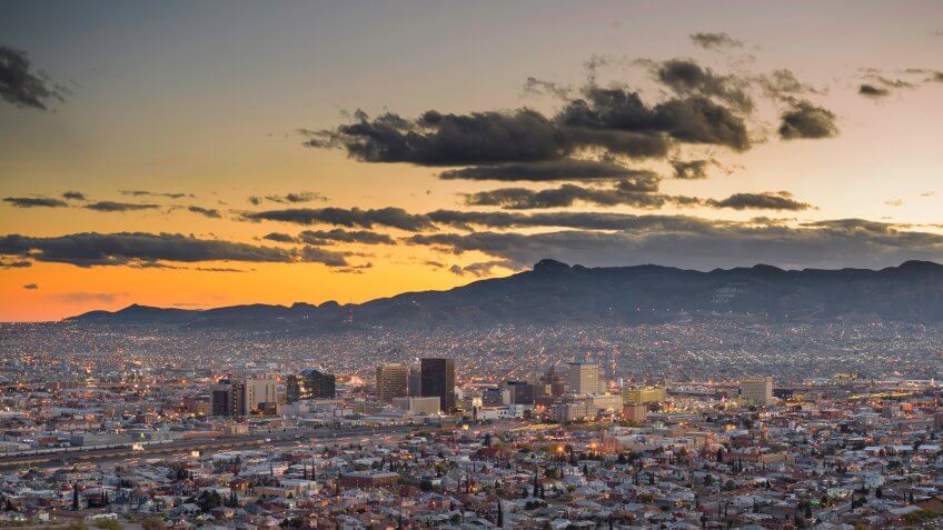 El Paso and Juarez in the background at dusk.