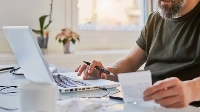 Middle aged man working from home.