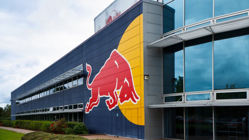 Milton Keynes, UK - July 9, 2012: Red Bull Racing factory/headquaters building with their typical logo painted on the side.
