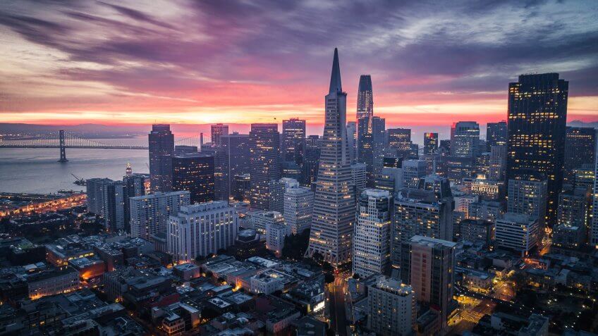 San Francisco Skyline with Dramatic Clouds at Sunrise, California, USA.