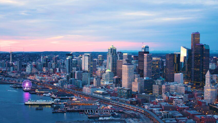 Seattle Washington USA Downtown Waterfront Aerial Panoramic Shot Pink Skies Sunset.