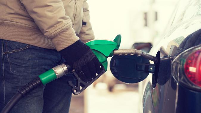 guy pumping gasoline
