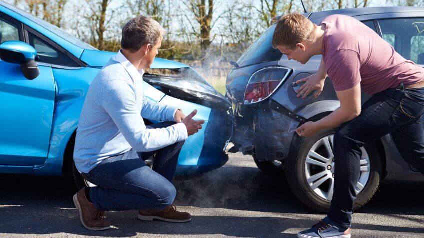 two guys getting in a fender bender