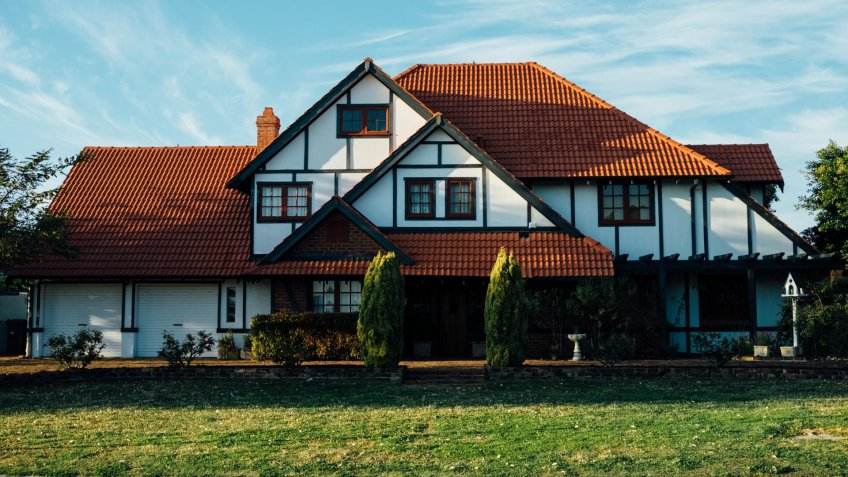 white and brown house during daytime