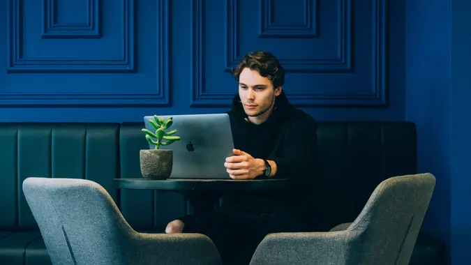 working at a blue coffee shop