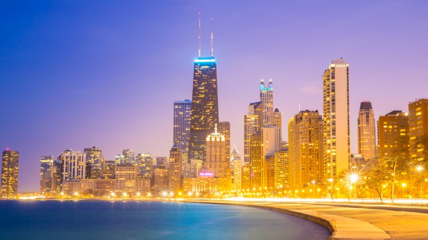 City of Chicago downtown and Lake Michigan at dusk.