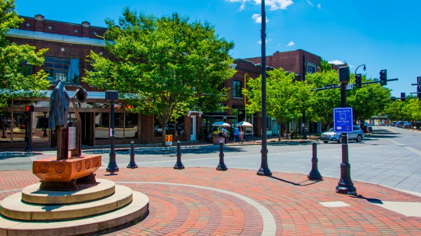 Durham, USA - June 18, 2016: A statue on a roundabout in the centre of Durham, North Carolina, USA.