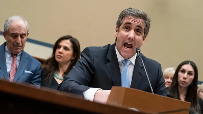 Photo by J Scott Applewhite/AP/REX/Shutterstock (10122325d)Michael Cohen, President Donald Trump's former personal lawyer, reads an opening statement as he testifies before the House Oversight and Reform Committee on Capitol Hill in WashingtonTrump Lawyer Investigation, Washington, USA - 27 Feb 2019.