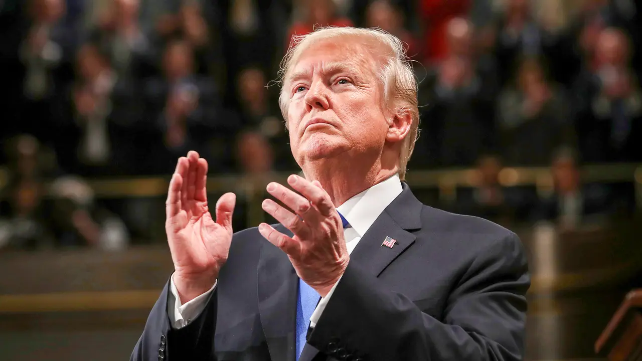 President Donald Trump claps his hands during State of the Union address in 2018
