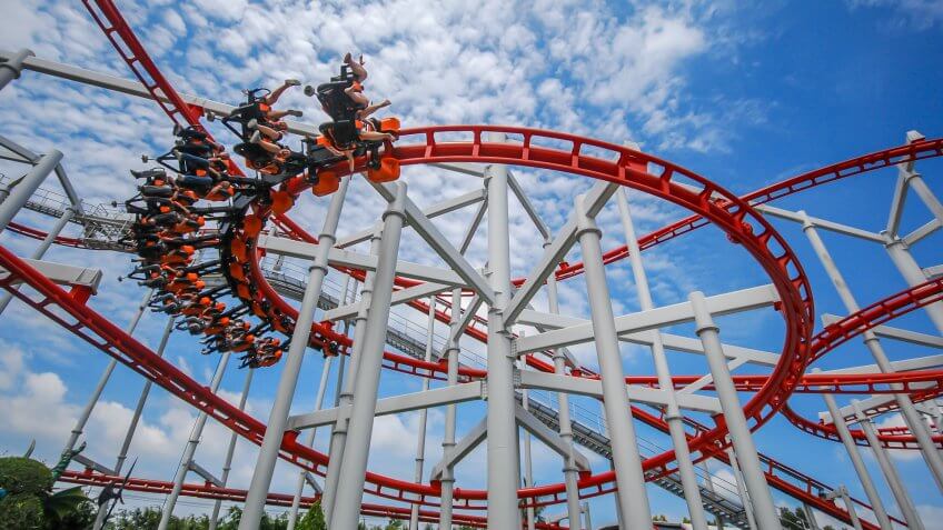 Rollercoaster against blue sky