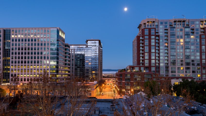 A full moon hangs over San Jose.
