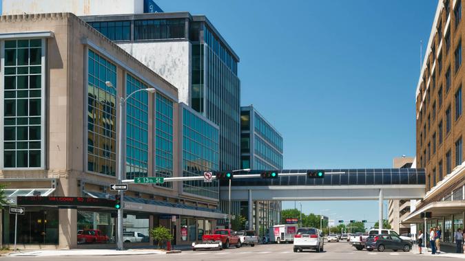 Lincoln, Nebraska, USA - July 9, 2013: People and traffic in downtown area of Lincoln, the capital city of the state of Nebraska.